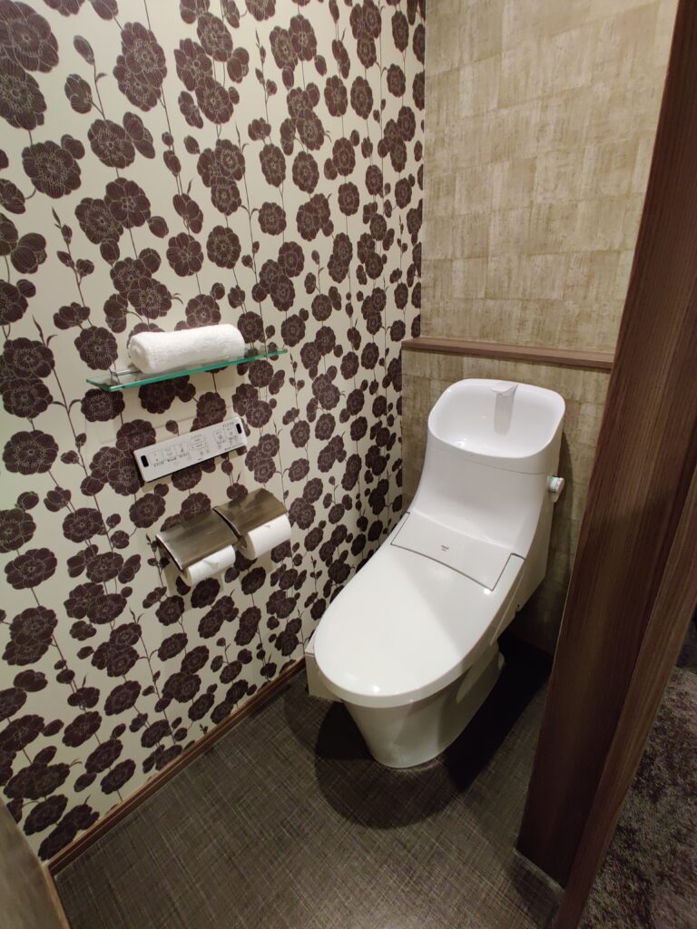 showing the separate toilet area in the hotel room recommendation in Furano 