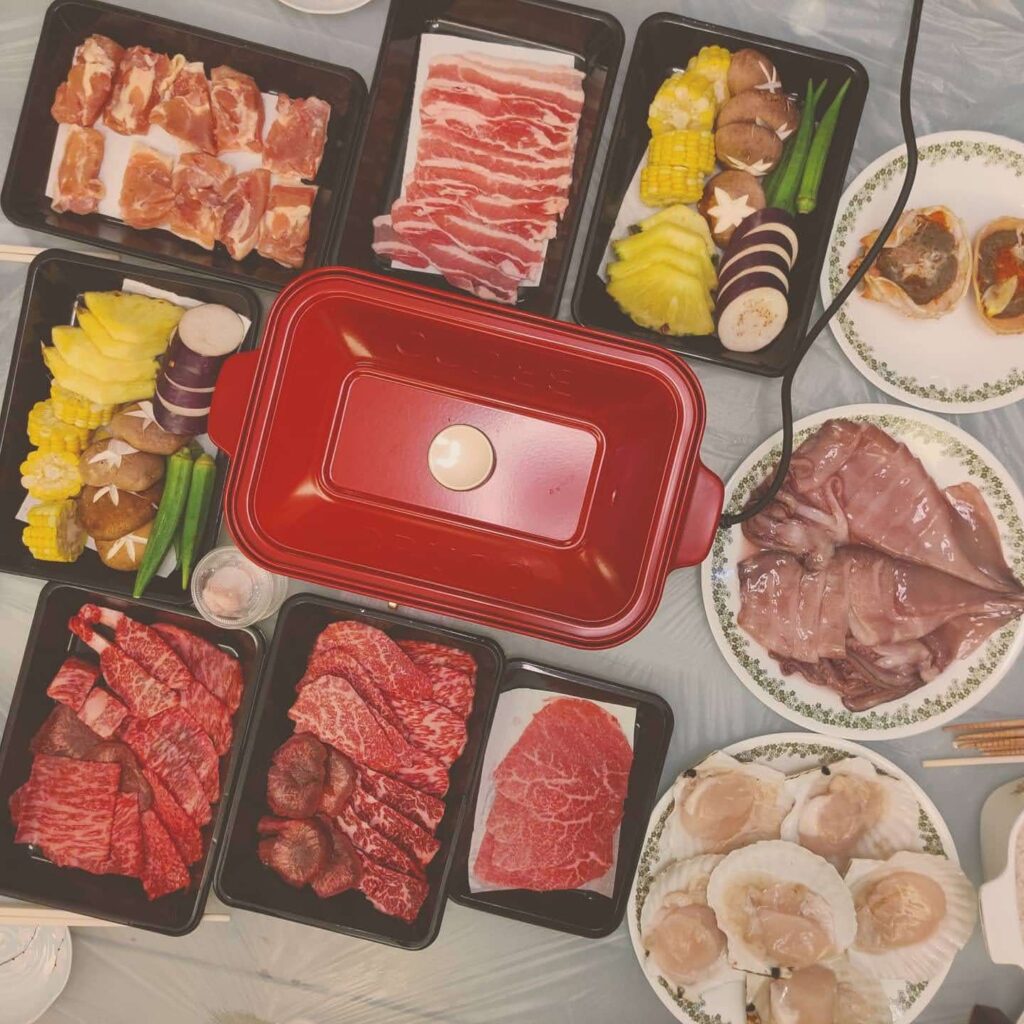 showing all the food in the set and the bruno multifunctional compact hot plate