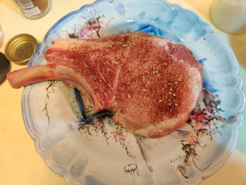 showing a image of my seasoned tomahawk pork chop